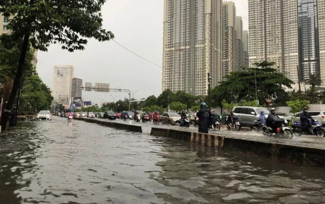 Đường Nguyễn Hữu Cảnh còn bị gọi là "rốn ngập" hay "con đường đau khổ" tại TP HCM nên dự án được k=ỳ vọng giải quyết tình trạng này