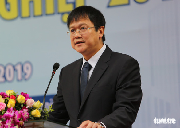 Cố Thứ trưởng Bộ GD-ĐT Lê Hải An phát biểu tại lễ khai mạc chương trình tư vấn tuyển sinh - hướng nghiệp do Bộ GD-ĐT phối hợp báo Tuổi Trẻ tổ chức - Ảnh: CHÍ TUỆ